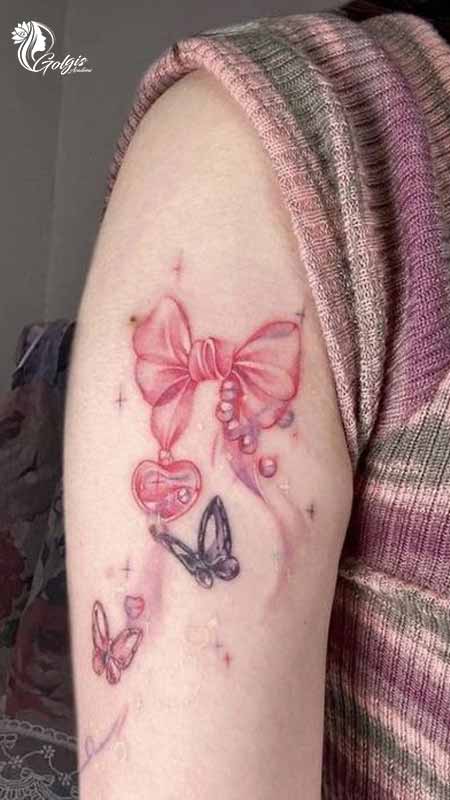 خالکوبی پاپیون و پروانه روی بازو